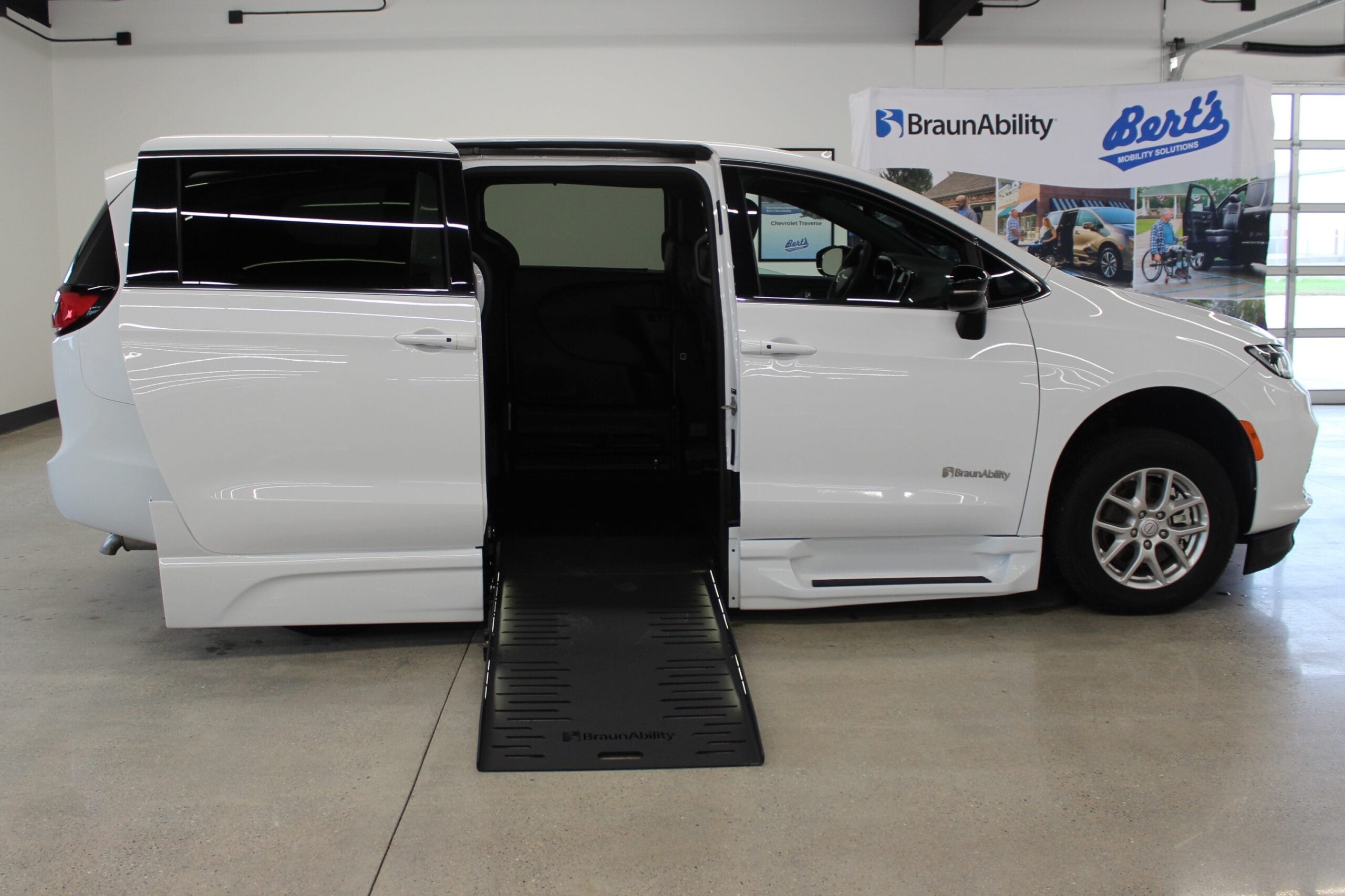 Preowned wheelchair vans for sale with the ramp deployed out