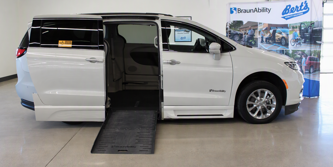 Ramp deployed in a used wheelchair mobility van for sale.